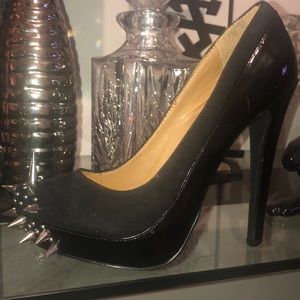 Black spiky toed heels